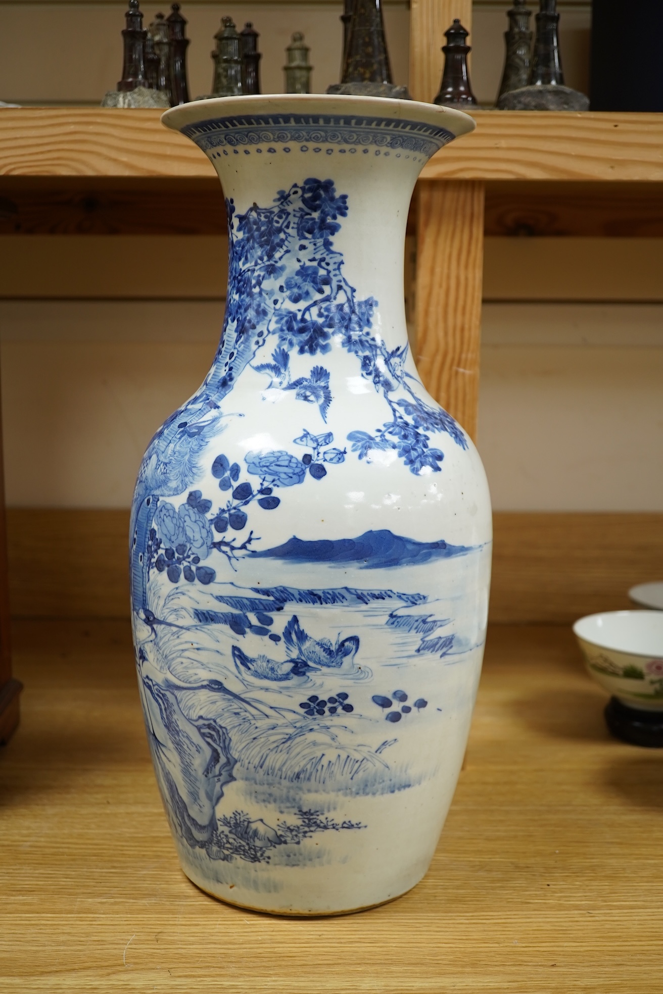 A late 19th century Chinese blue and white ‘Hundred Birds’ baluster vase, 44cm high